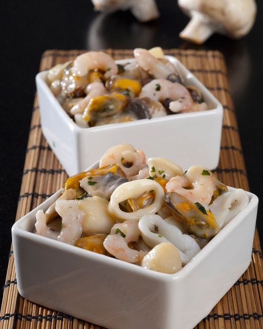 recipe image Cassolette de fruits de mer au champignons de Paris