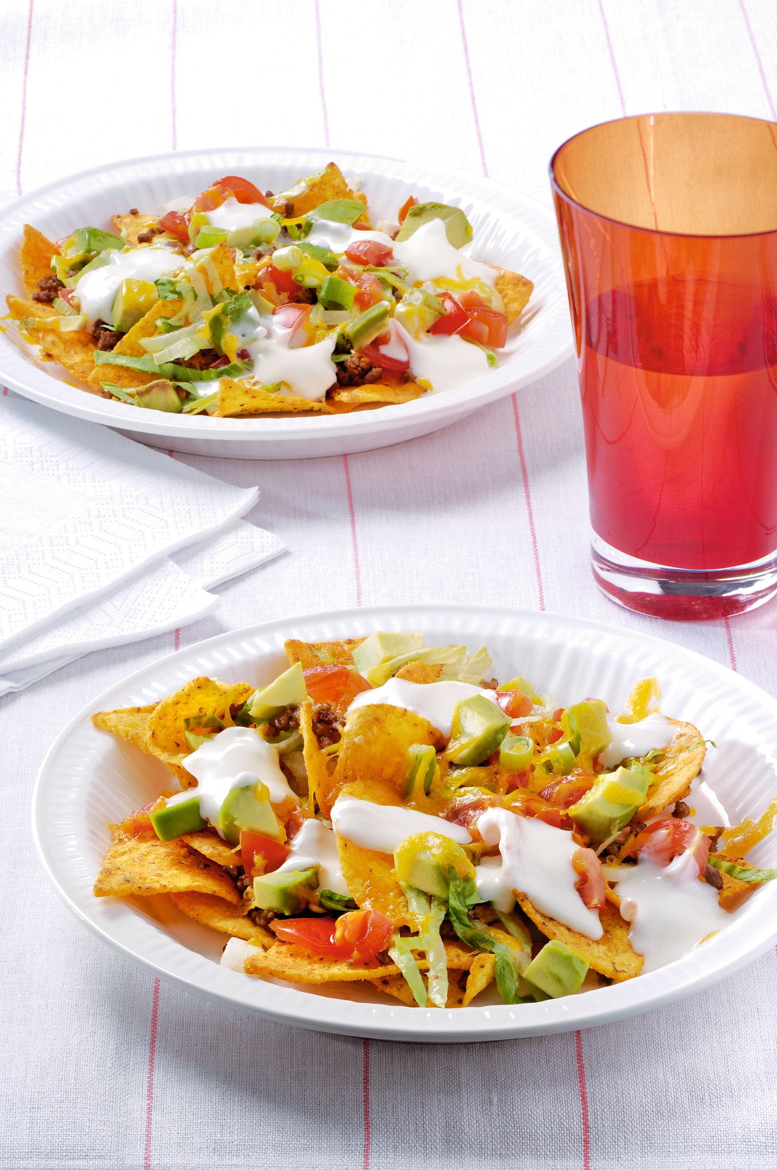 recipe image Tacochips met salade, gehakt, tomaat, kaas en lente-uitjes