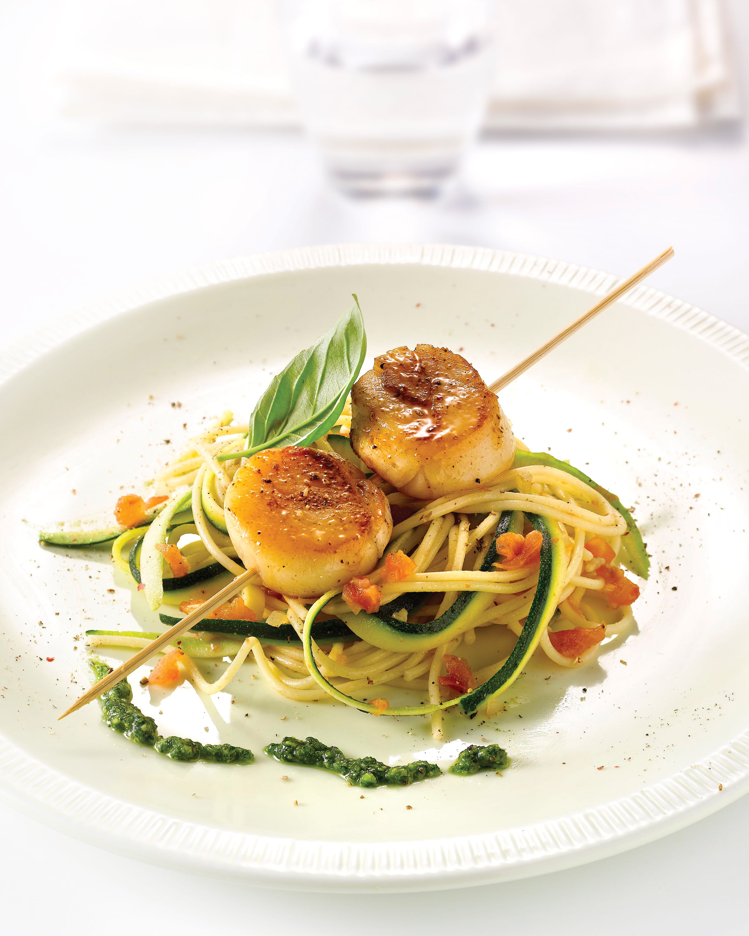 recipe image Spaghettinis aux noix de Saint-Jacques et pesto frais