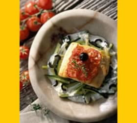 recipe image Coeur de filet de cabillaud garni de tomates et de courgettes croquantes
