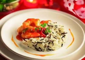recipe image Riz sauvage à la sauce aigre-douce, scampi et mâche