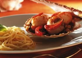 recipe image Coquilles Saint-Jacques poêlées sur un lit de ratatouille