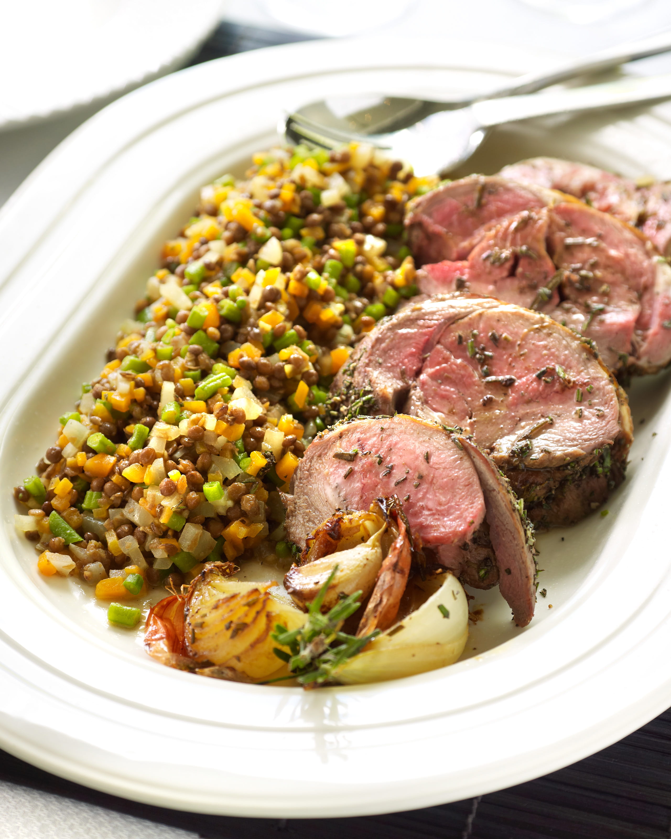 recipe image Rôti d'agneau au romarin et aux lentilles