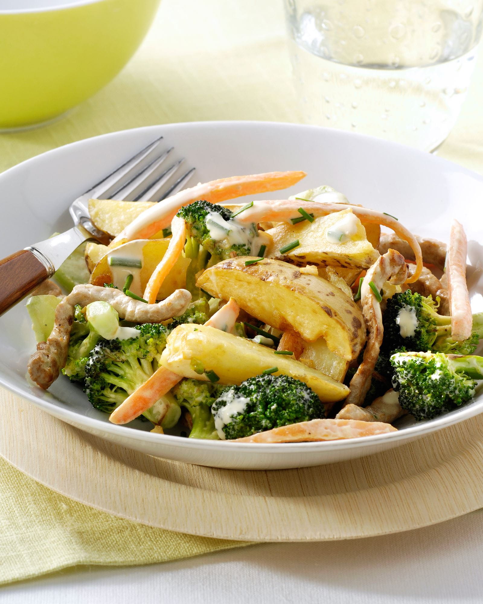recipe image Emincé de porc sauté à la moutarde, aux carottes et brocoli