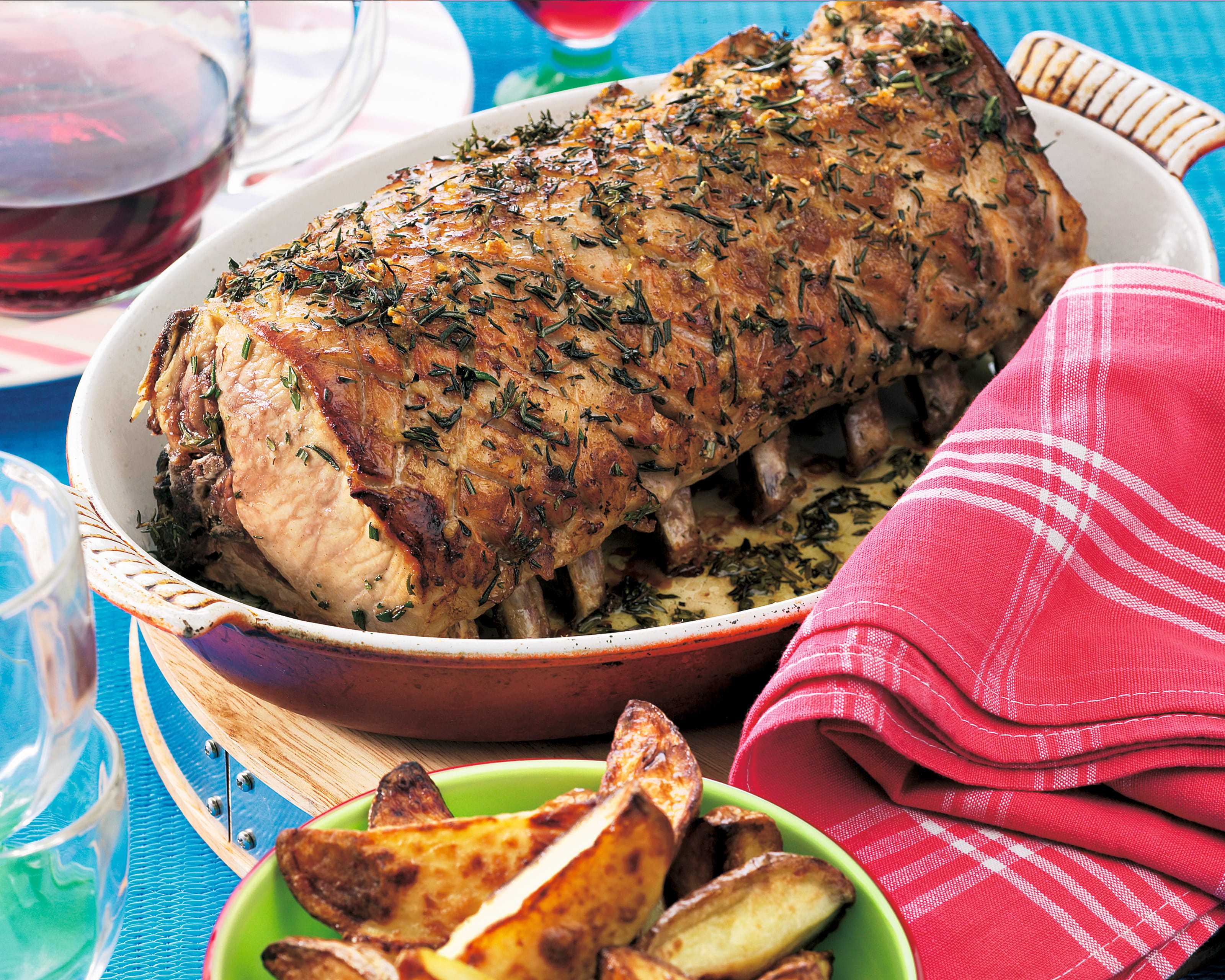 recipe image Entrecôte de porc rôtie au thym et romarin
