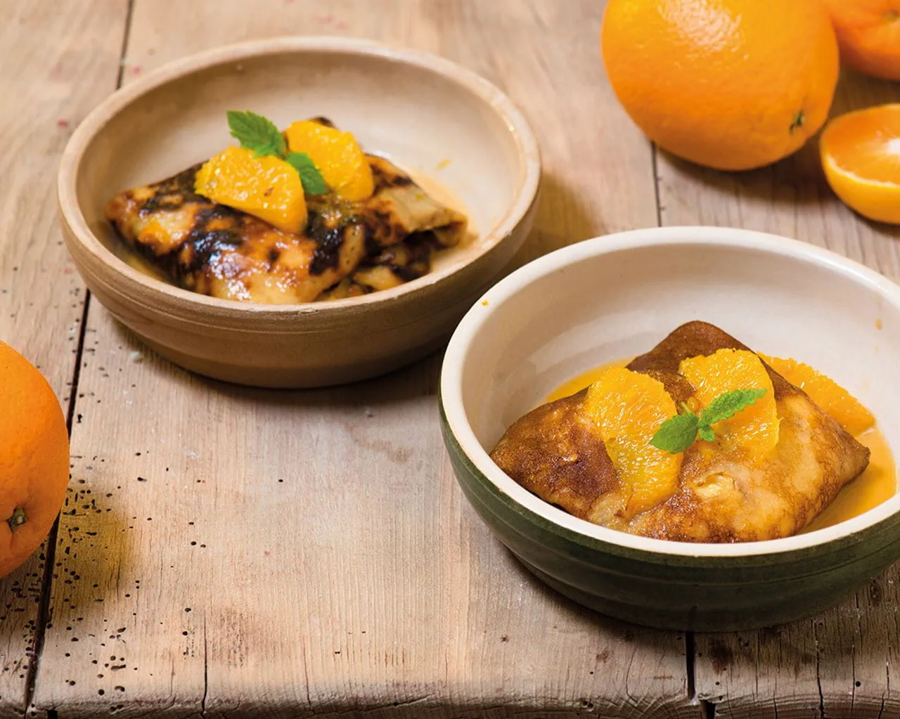 recipe image Gevulde pannenkoeken met banketbakkersroom en sinaasappelsaus