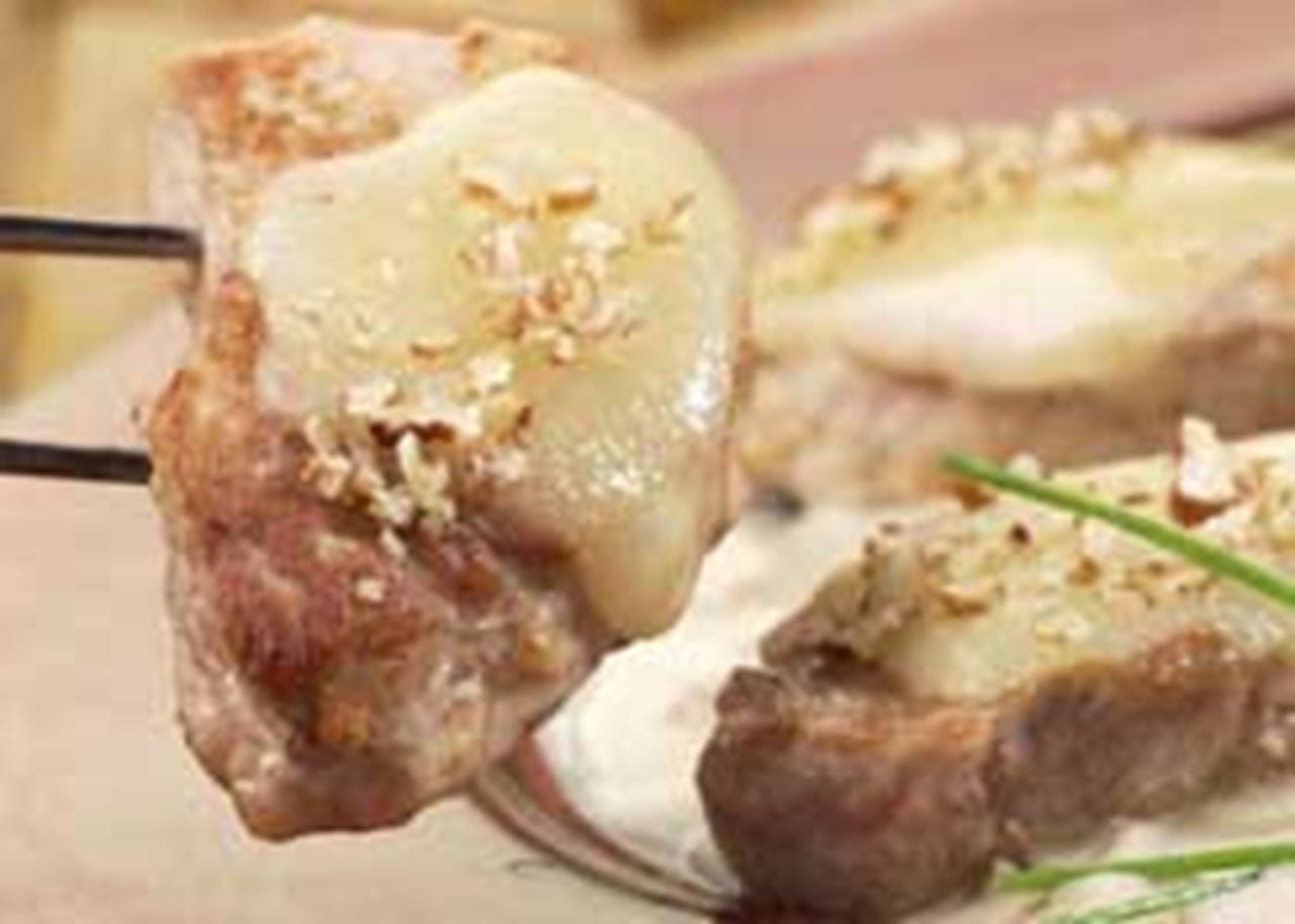 recipe image Varkensfilet met gesmolten Comté en morieljes