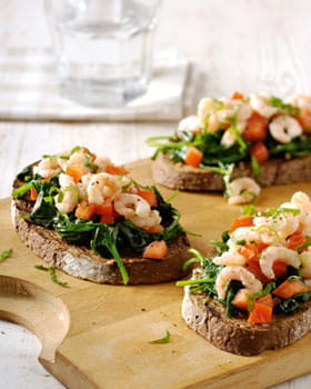 recipe image Bruschetta met gebakken spinazie, tomaat en garnalen