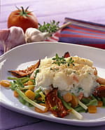 recipe image Vispannetje met garnalen met een krokant korstje en een stoofpotje van verse groenten en gedroogde tomaat