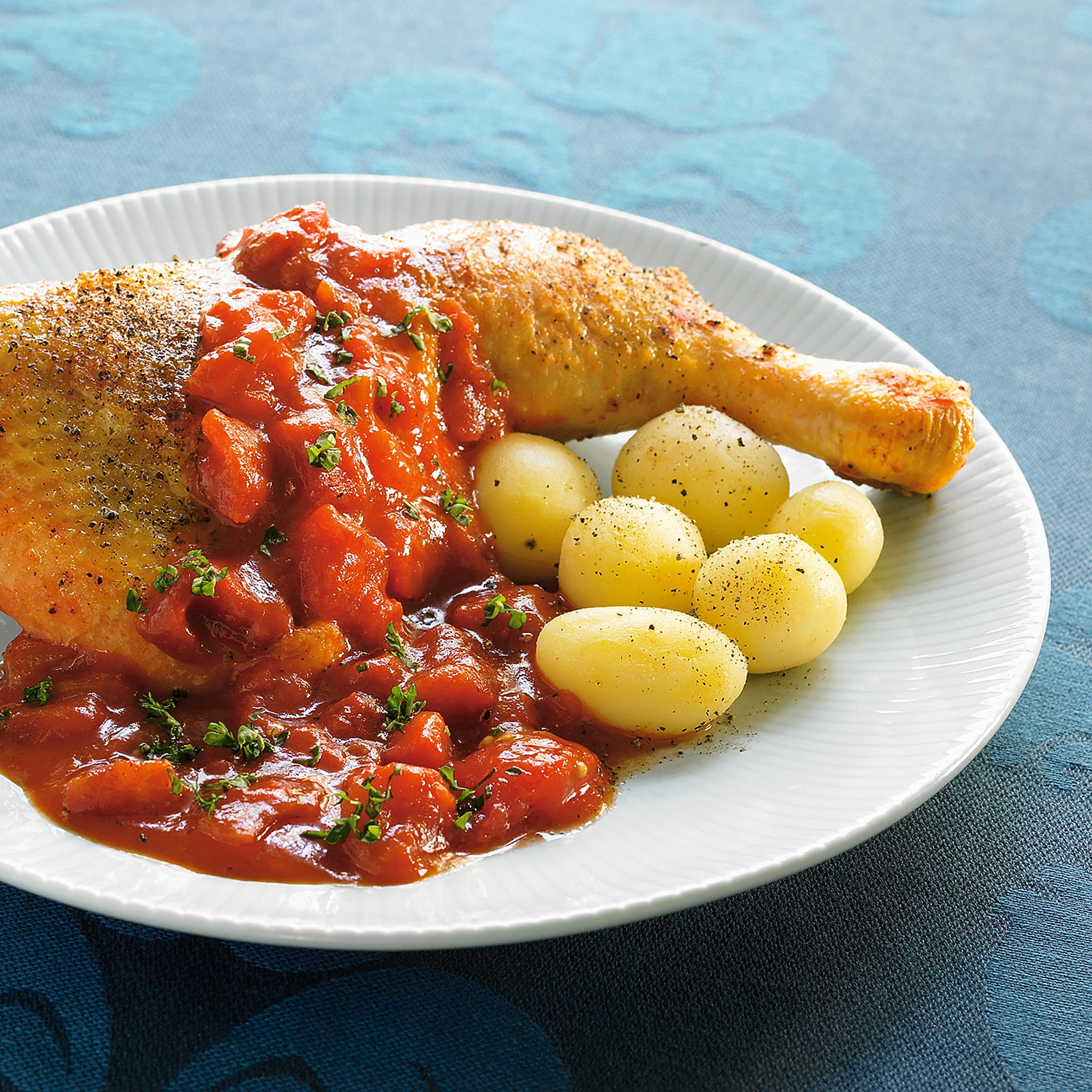 recipe image Kippenbouten in tomatensaus