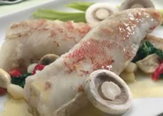recipe image Rode poon met inktvis op een bedje van groenten