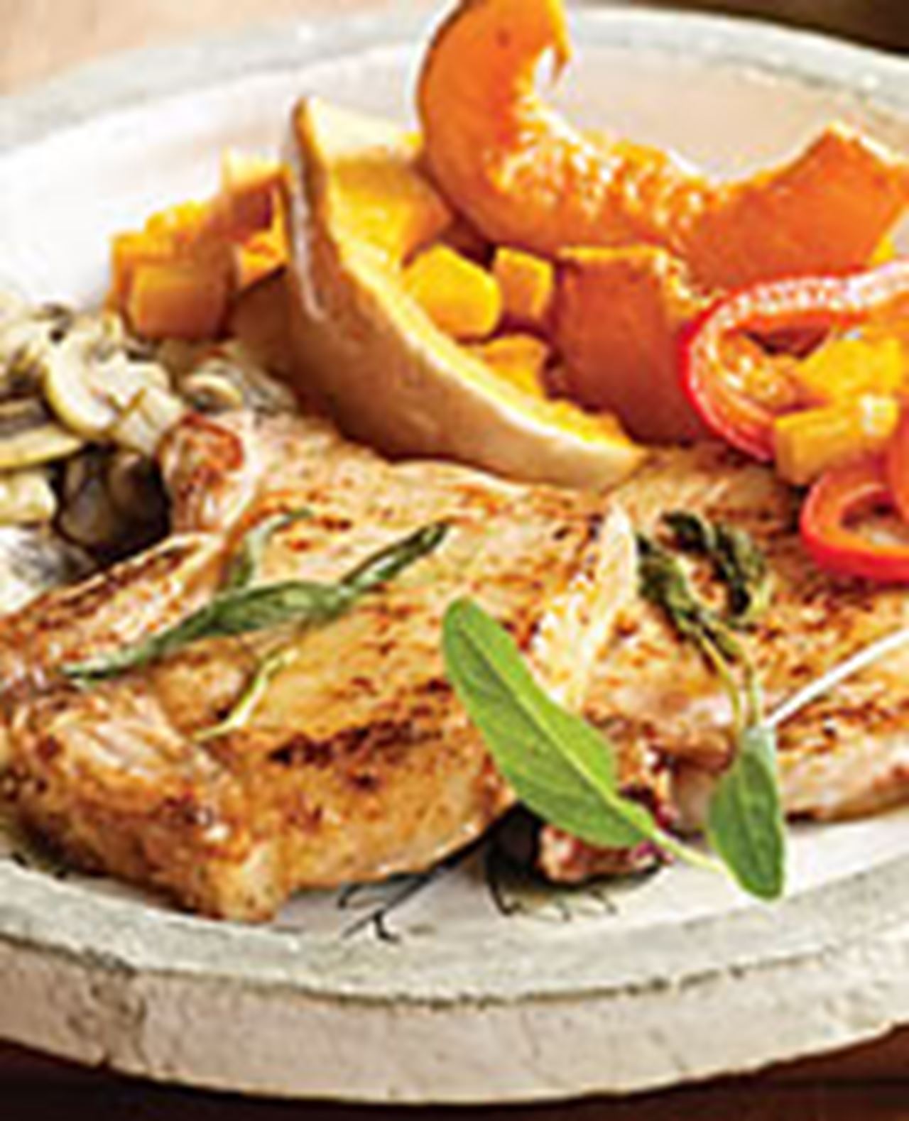 recipe image Gebakken varkensvlees met pompoen