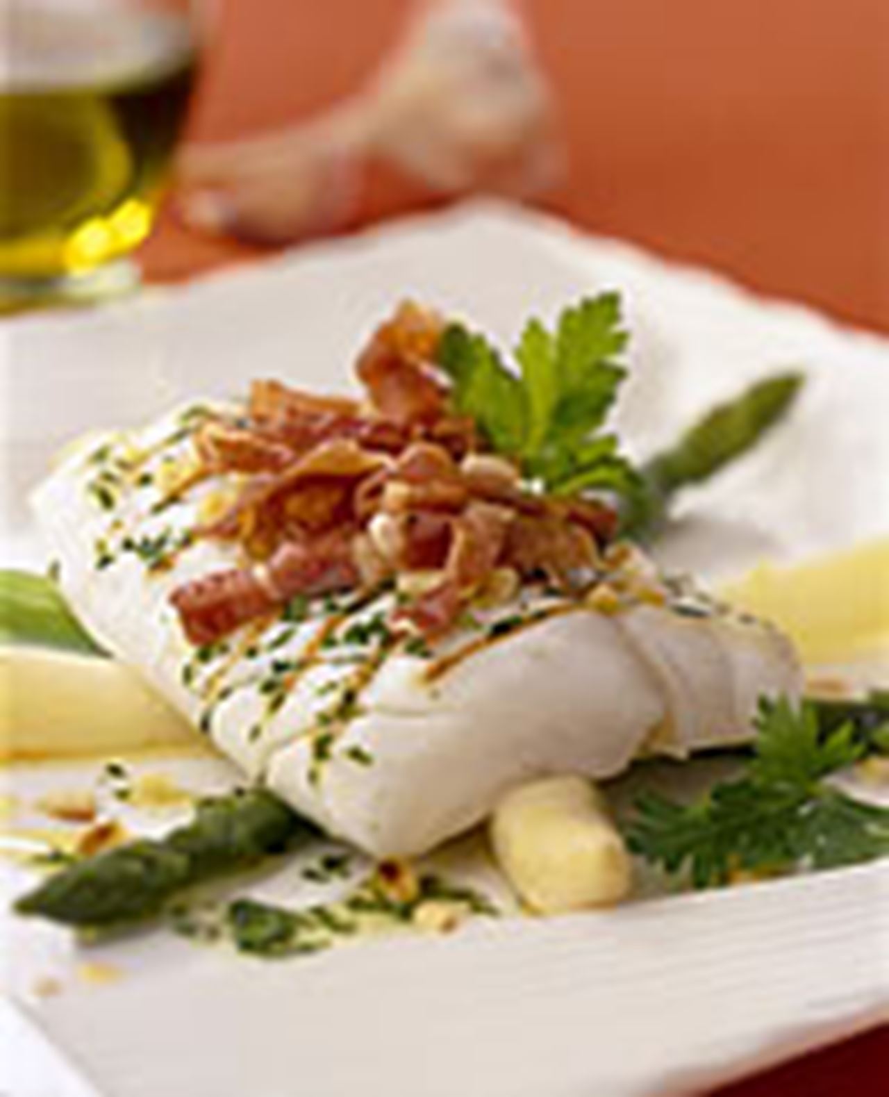 recipe image Kabeljauw met Parmaham, spek  en asperges (met video !)