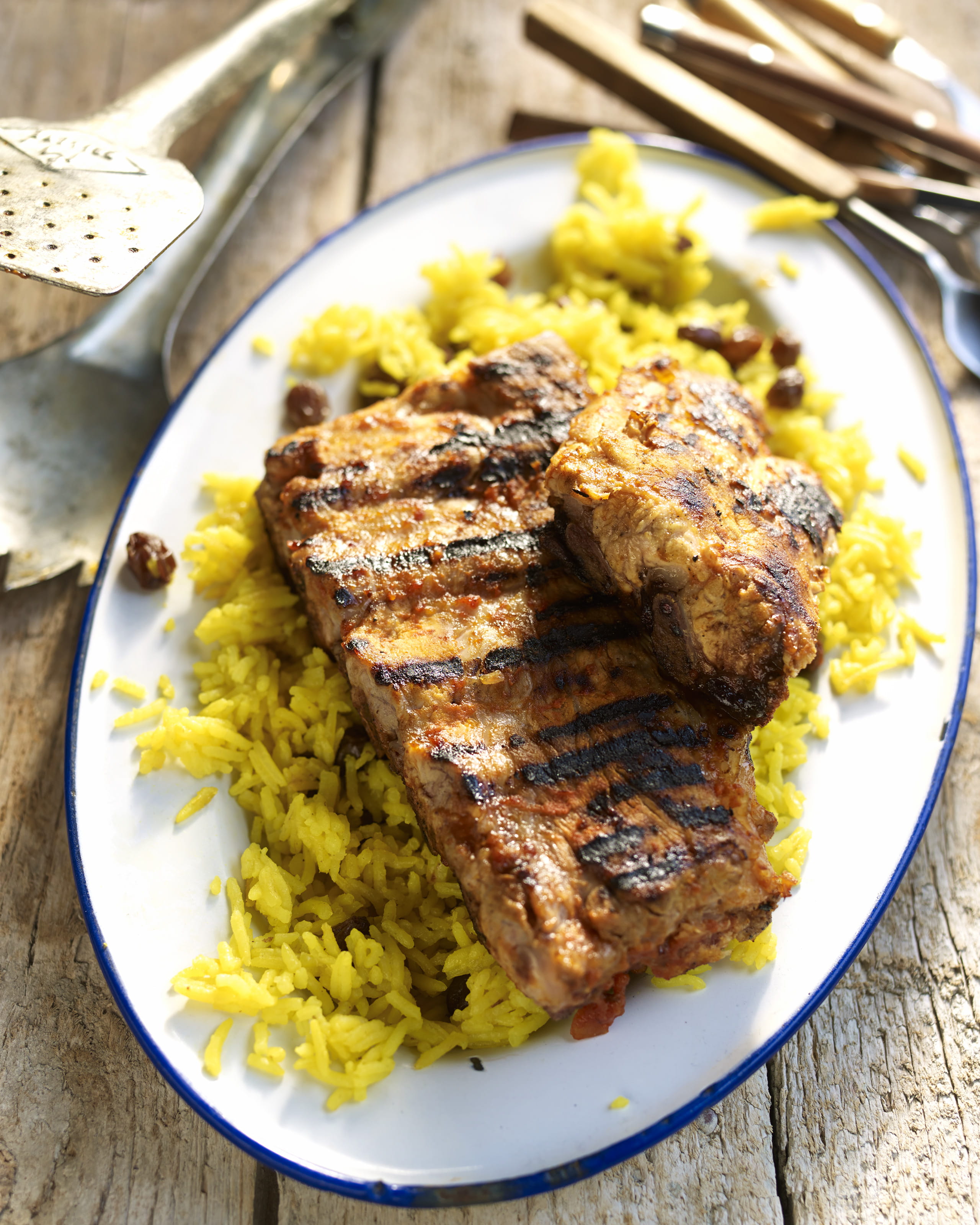 recipe image Spare-ribs met Zuid-Afrikaanse marinade en gele rijst