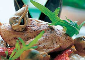 recipe image Risotto met kalkoen, mosselen en pesto van gedroogde tomaat