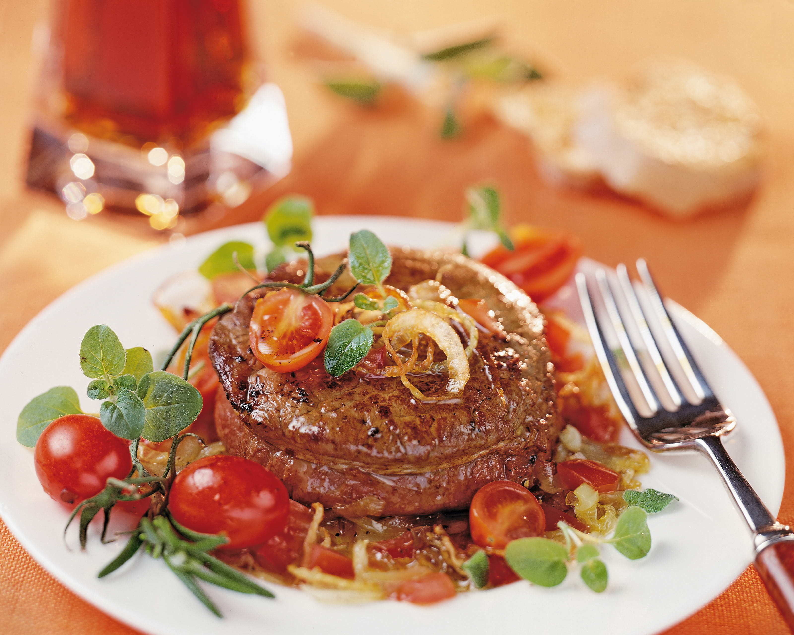 recipe image Rundvleesburgers met gebakken ui en paprika