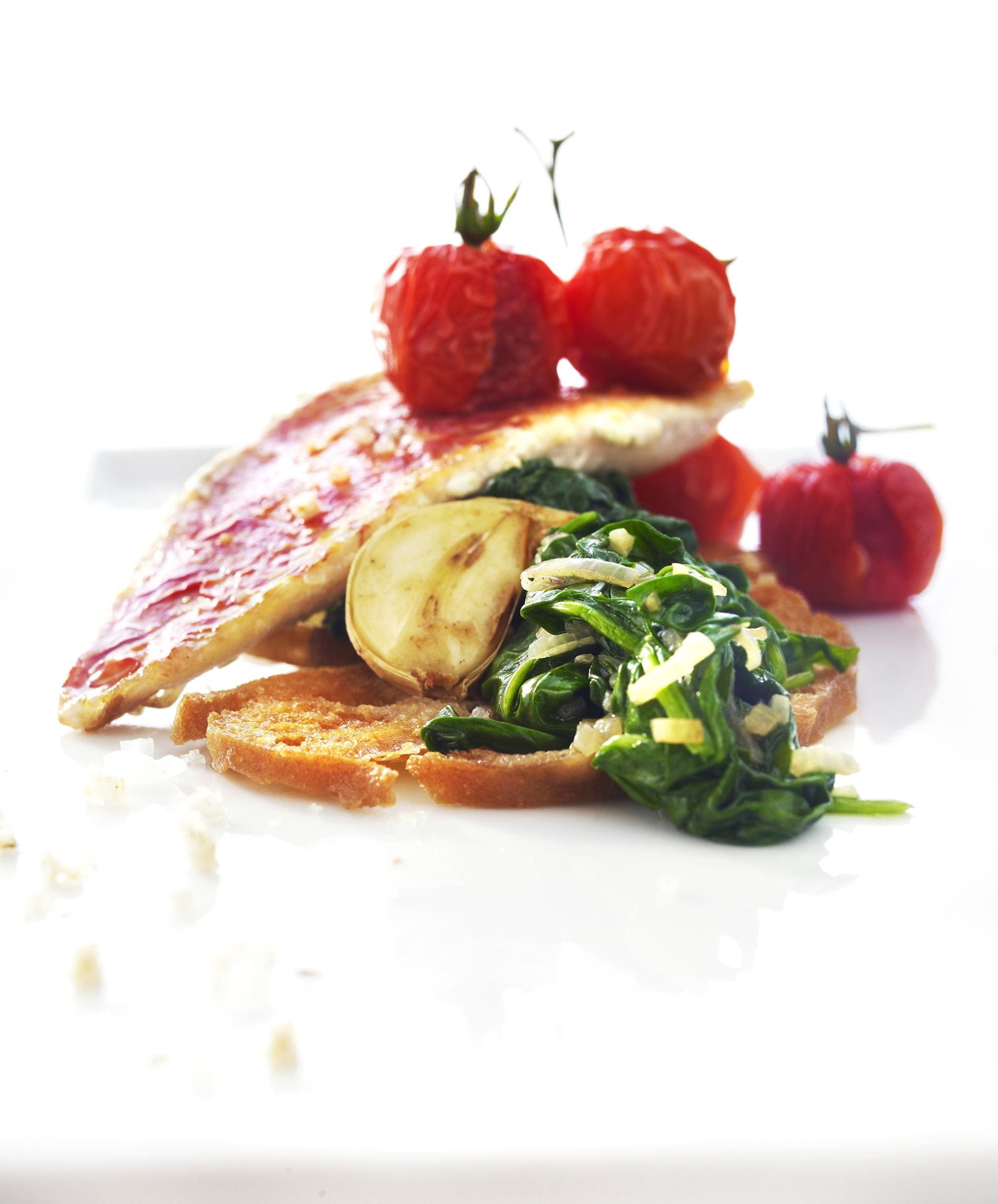 recipe image Jonge spinazie met roodbaarsfilet