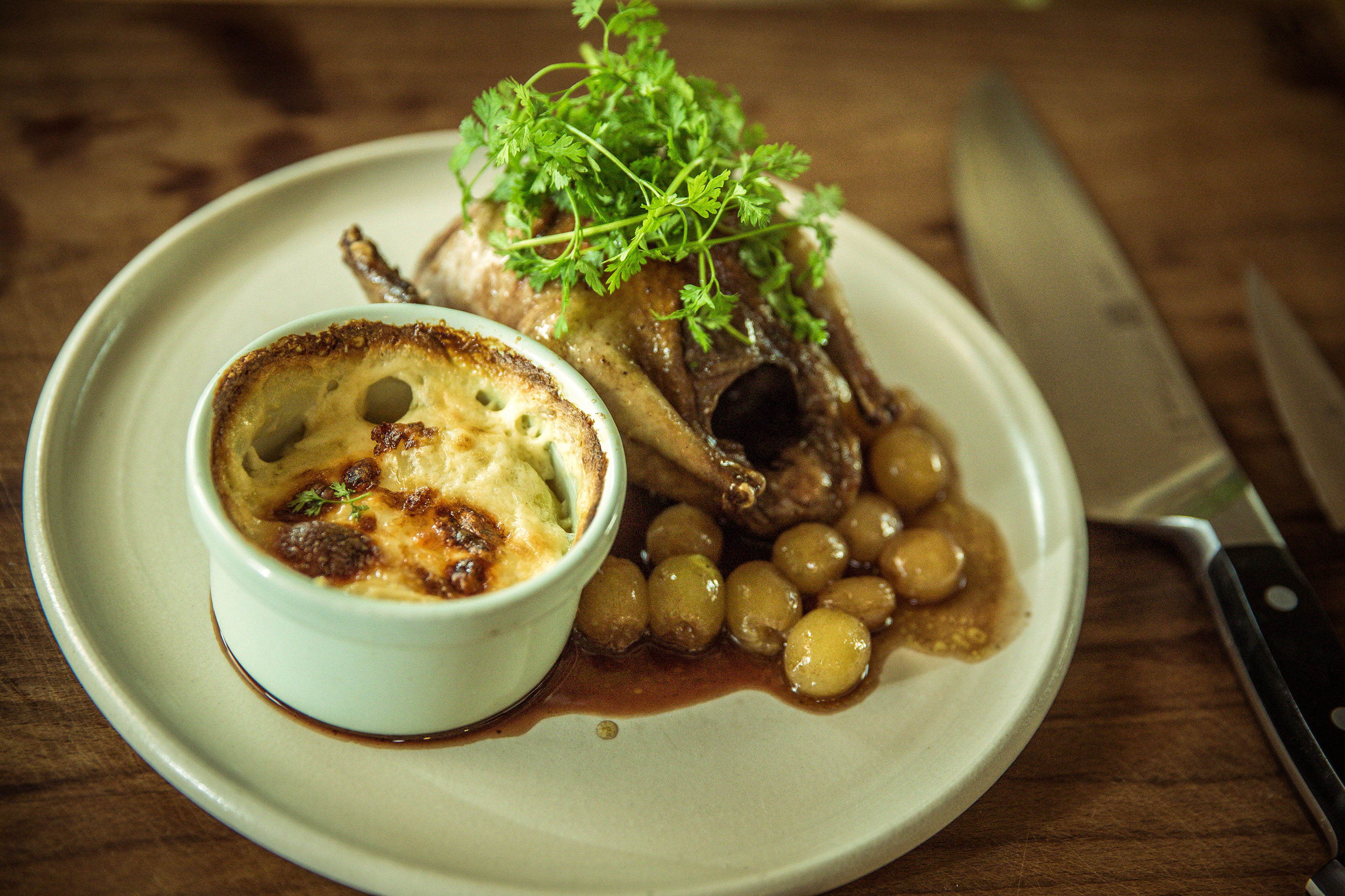 recipe image Duif met gratin dauphinois en druivensaus