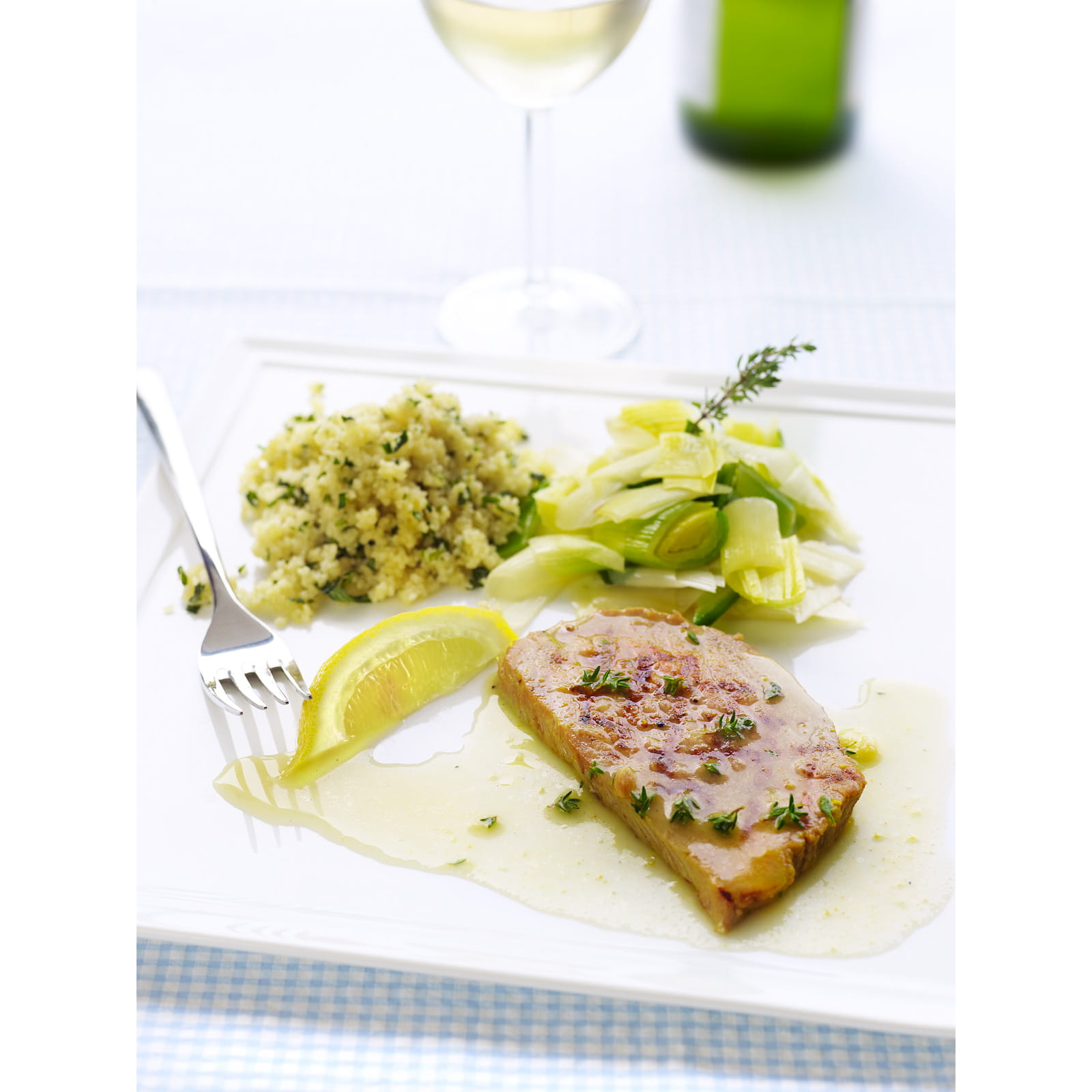 recipe image Gegrilde kalfslapjes met een citroensausje en kruidige couscous