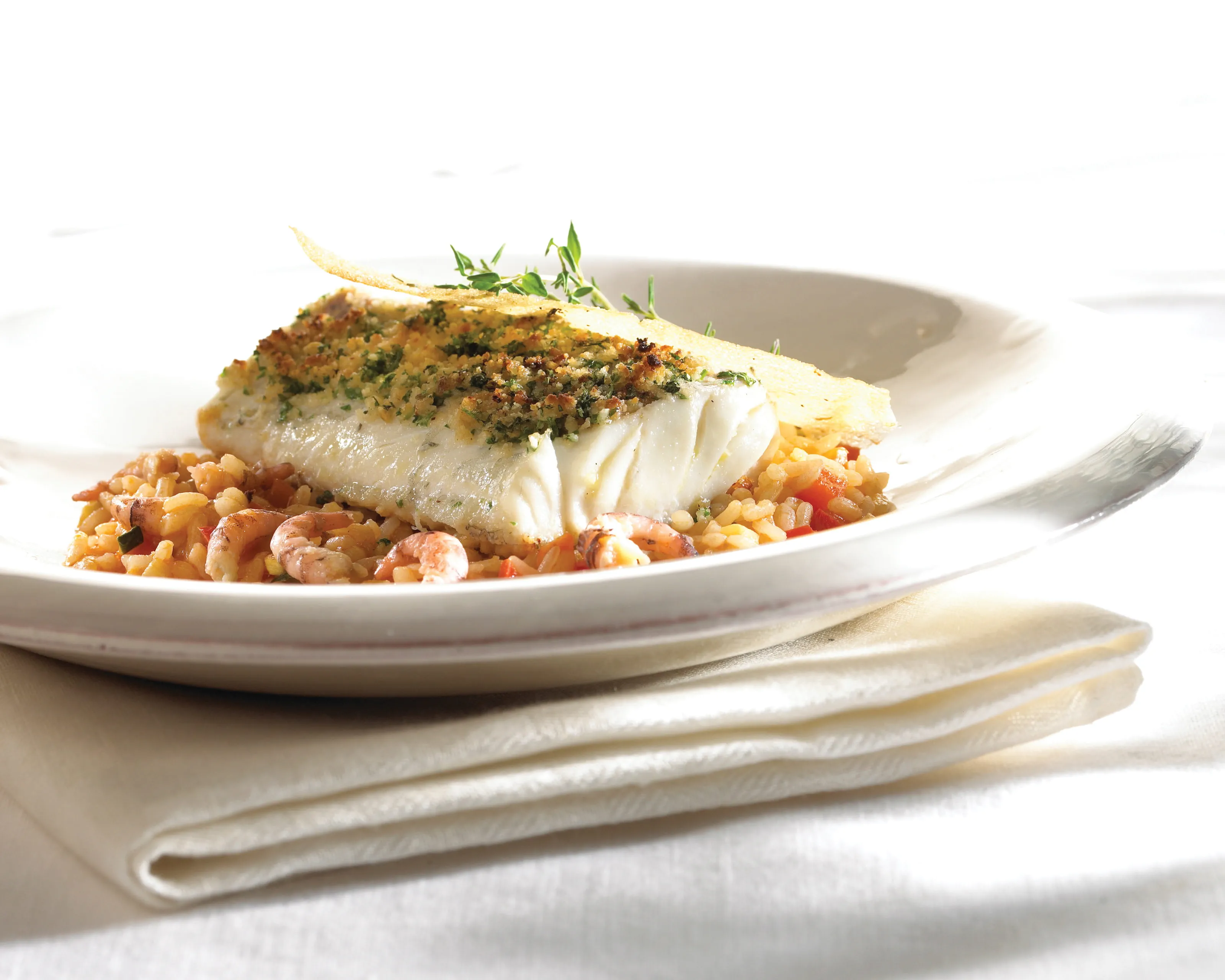 recipe image Risotto, kabeljauw met kruidenkorst en een krokant koekje