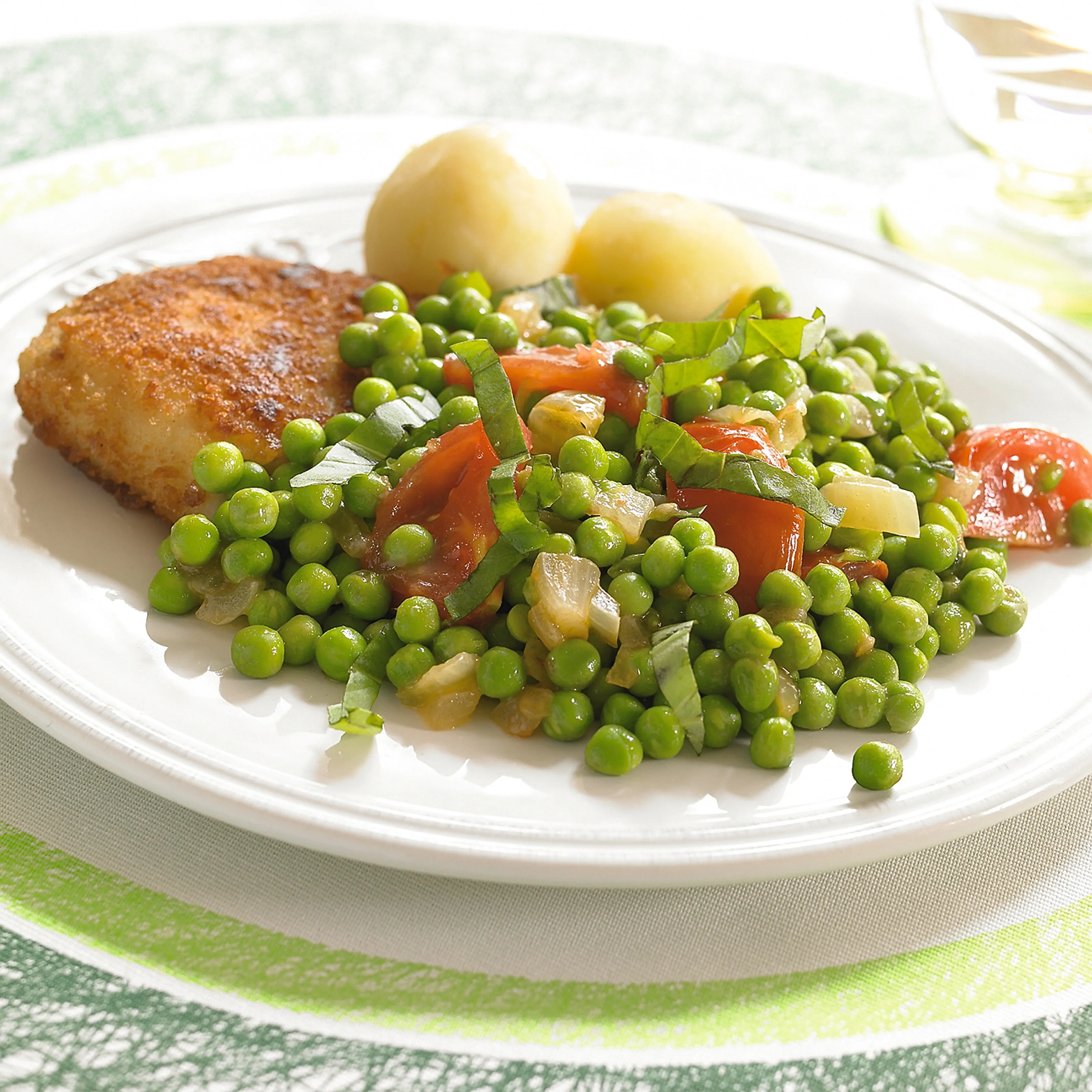 recipe image Romige doperwten met tomaat